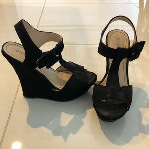 Black suede platform heels.